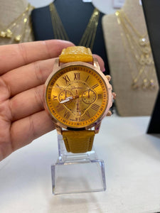 RELOJ ROMANOS MOSTAZA