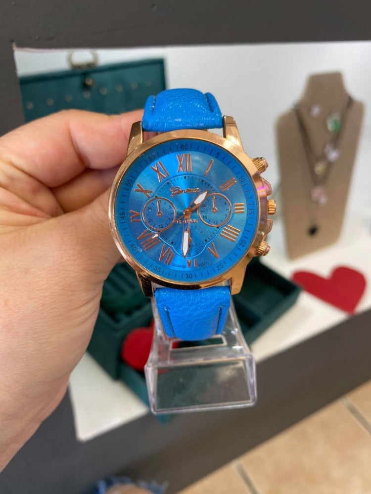 RELOJ ROMANOS AZUL CELESTE