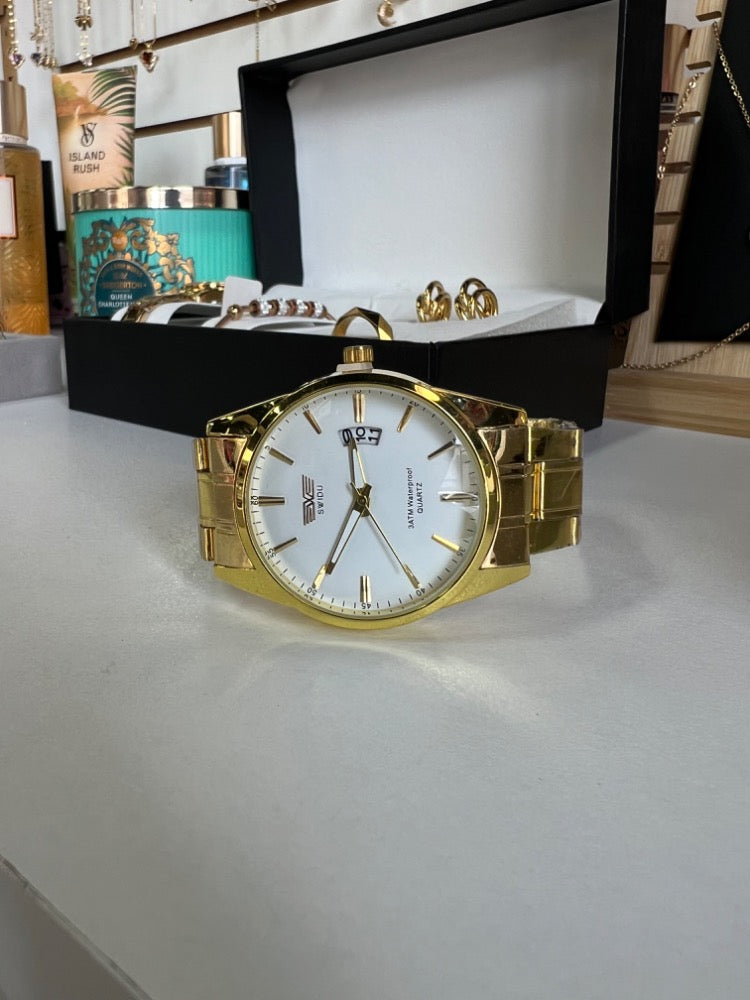 RELOJ SWIDU DORADO FONDO BLANCO